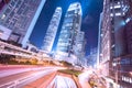 Hong Kong business district at night with light trails Royalty Free Stock Photo