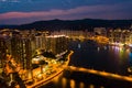 Hong Kong, China - 2020: bridge and buildings at night, aerial view