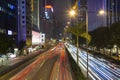 HONG KONG, CHINA - December 12: Car light trails scene at night on Gloucester Road in Wan Chai Disctrict, Hong Kong, China. Royalty Free Stock Photo