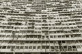 Exterior of crowded hig rise residential building in Hong Kong city