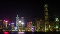 HONG KONG, CHINA - DECEMBER 8, 2016: Hong Kong city skyline at night over Victoria Harbor with clear sky and urban skyscrapers, Royalty Free Stock Photo