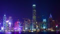 HONG KONG, CHINA - DECEMBER 8, 2016: Hong Kong city skyline at night over Victoria Harbor with clear sky and urban skyscrapers, Royalty Free Stock Photo