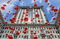 Hong Kong, China: Red Chinese lantern garland decorations adorn The Peninsula Hotel building exterior on Chinese New year Royalty Free Stock Photo