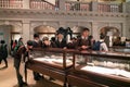 Hong Kong History Museum interior view. School boys study exposition of Chinese - British