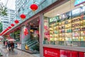 Hong Kong city street is decorated with red festive Chinese lanterns during Chinese New Year celebration