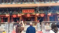 Crowded temple Sik Sik Yuen Wong Tai in Hong Kong