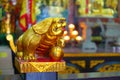 HONG KONG, CHINA - JANUARY 26, 2017: Tsz wan temple, with a hell representation, with a golden statue, in Hong Kong