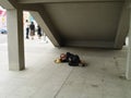 Sleeping drunk homeless on the streets of Hong Kong