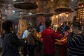 Hong kong china - march17,2019 : unidentified people praying in Hung Hom Kwun Yum Temple one of most important in kowloon district Royalty Free Stock Photo