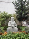 Beautiful shot of a statue of an old wise Chinese man in Hong Kong, China