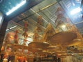 Low angle shot of a beautiful golden colored chandeliers in a shop in Hong Kong, China Royalty Free Stock Photo