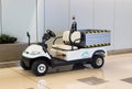 Hong Kong, China - September 22, 2018: White electric utility golf cart or buggy car for transportation of baggage and cargo Royalty Free Stock Photo