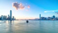 Hong Kong, China skyline panorama with skyscrapers day to night from across Victoria Harbor timelapse. Royalty Free Stock Photo