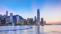 Hong Kong, China skyline panorama with skyscrapers day to night from across Victoria Harbor timelapse. Royalty Free Stock Photo