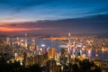 Hong Kong city on dramatic sky at sunset view from mountain Royalty Free Stock Photo