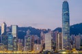 Hong Kong city office building over Victoria bay .
