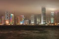 Hong Kong cityscape by night with low clouds level Royalty Free Stock Photo