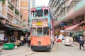 Double-decker trams. Double-deck electric tram moving on the street of Hong Kong.