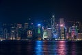 Hong Kong - December 9, 2017. New year and Christmas skyline shines landmark at Victoria harbour night scene with fog in Hong