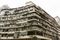 Hong Kong - December 2019 : White Tenement Houses, Old Residential Buildings in Tai Kok Tsui, Hong Kong, Low Angle View