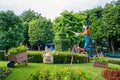 Goofy is decorating his garden at Hong Kong Disneyland