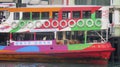 Closeup of colorful Star Ferry boat at Hong Kong terminal pier