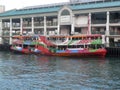 Colorful Star Ferry boat at Hong Kong terminal pier