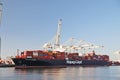 Hong Kong Express from Hapag-Lloyd loading and unloading containers in the Maasvlakte harbor in the Port of Rotterdam