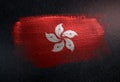 Hong Kong Flag Made of Metallic Brush Paint on Grunge Dark Wall