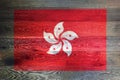 Hong Kong flag on rustic old wood surface background Royalty Free Stock Photo