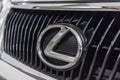 Hong Kong, Hong Kong - 25 April 2018: Close-up of Lexus logo badge and car grill on a white Lexus IS luxury sports sedan