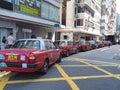 Row of taxi cars in Hong Kong, China Royalty Free Stock Photo