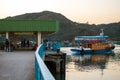 Big ferry boat departs from the pier in Sok Kwu Wan village on Lamma Island. Ferry boats in Hong Kong transport people by plenty