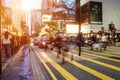 People walking across Road, Causeway Bay in front of a big department store at Daylight. Hong Kong January Royalty Free Stock Photo