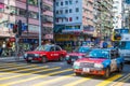 Hong Kong - January 10, 2018 :Red taxi cab stop at pedestrians t Royalty Free Stock Photo