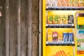 Yellow vending machine and shutter door in Tai o fishing village, Hong Kong