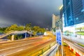 HONG KONG - MAY 4, 2014: City streets and traffic at night. Hong Kong hosts 15 million tourists annually Royalty Free Stock Photo