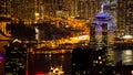 Hong Kong night view boat parking port surrounded by skyscraper