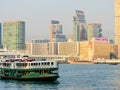 Star Ferry boat crosses the Victoria Harbour, Hong Kong Royalty Free Stock Photo