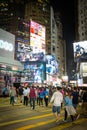 HONG KONG - October 2015: Pedestrians in a crosswalk Causeway Bay district in Hong Kong