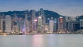 Hong Kong office building over seacoast night view Royalty Free Stock Photo