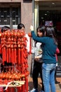 Hong Kong: People shopping for red Chinese New Year decorations Royalty Free Stock Photo