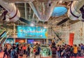 Hong Kong Science Museum interior view. People watch attractions demonstrating various physical phenomena