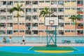 Choi Hung Estate rainbow apartment building and colorful basketball court in Hong Kong