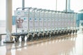 Hong Kong - September 22, 2016 :row of baggage trolleys at airport Royalty Free Stock Photo