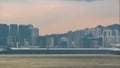 Hong Kong skyline in the morning over Victoria Harbour timelapse. Royalty Free Stock Photo