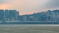 Hong Kong skyline in the morning over Victoria Harbour timelapse. Royalty Free Stock Photo