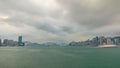 Hong Kong skyline in the morning over Victoria Harbour timelapse. Royalty Free Stock Photo