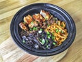 Hong Kong style pork rib beef claypot rice laid out on a wooden board Royalty Free Stock Photo