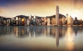 Hong Kong at sunrise with reflection, Financial downtow with skyscrapers Royalty Free Stock Photo